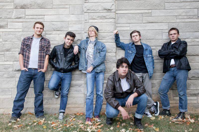 Freshman Simon Mullins (center) died today. Mullins played Johnny in The Outsiders at South.