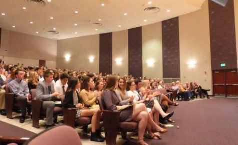 NHS inductees wait to be acknowledged.