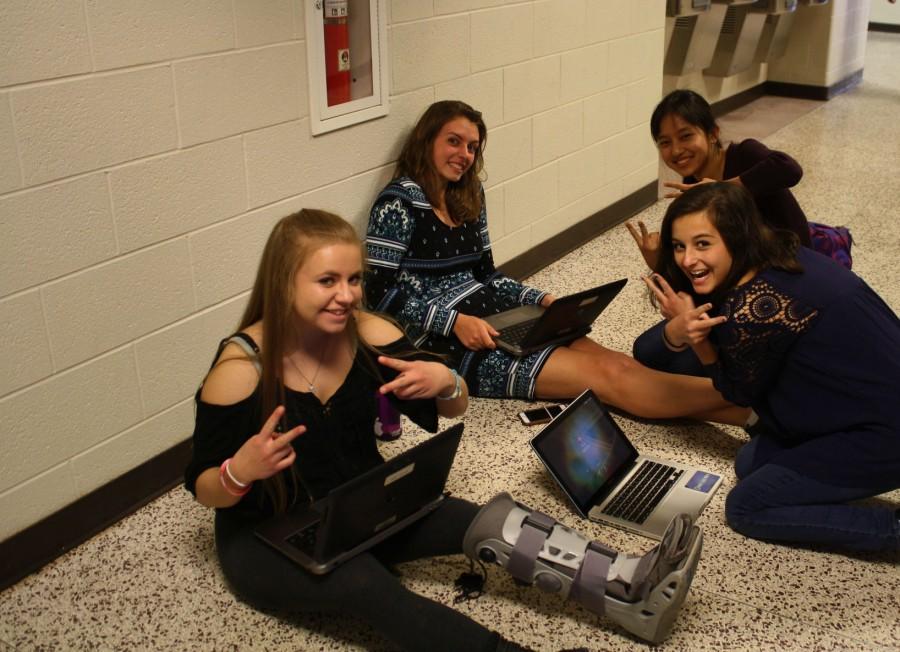 Students study in the hallway