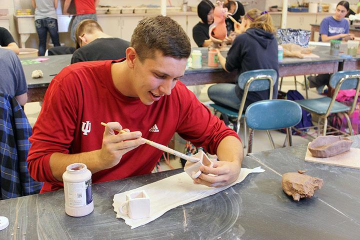 Student constructs teacups