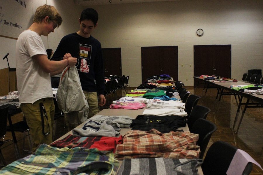 Students look at Fashion Club sale