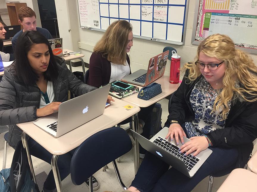 Yearbook members work hard to meet a deadline