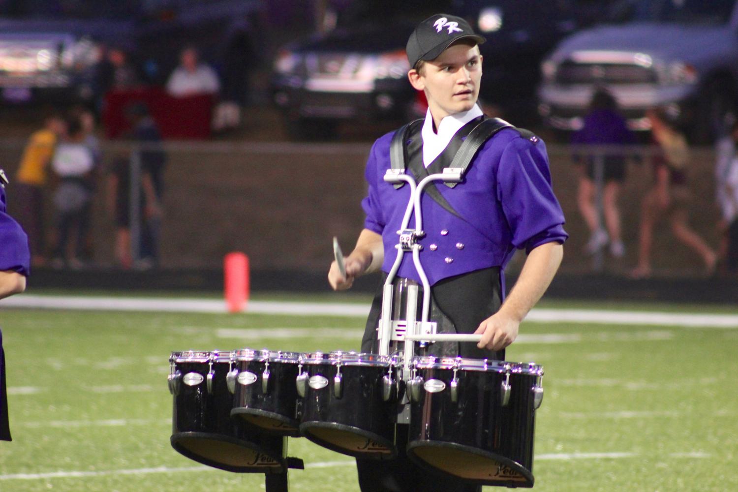 Senior TJ Tankersley performs with Panther Regiment during last years half time show.