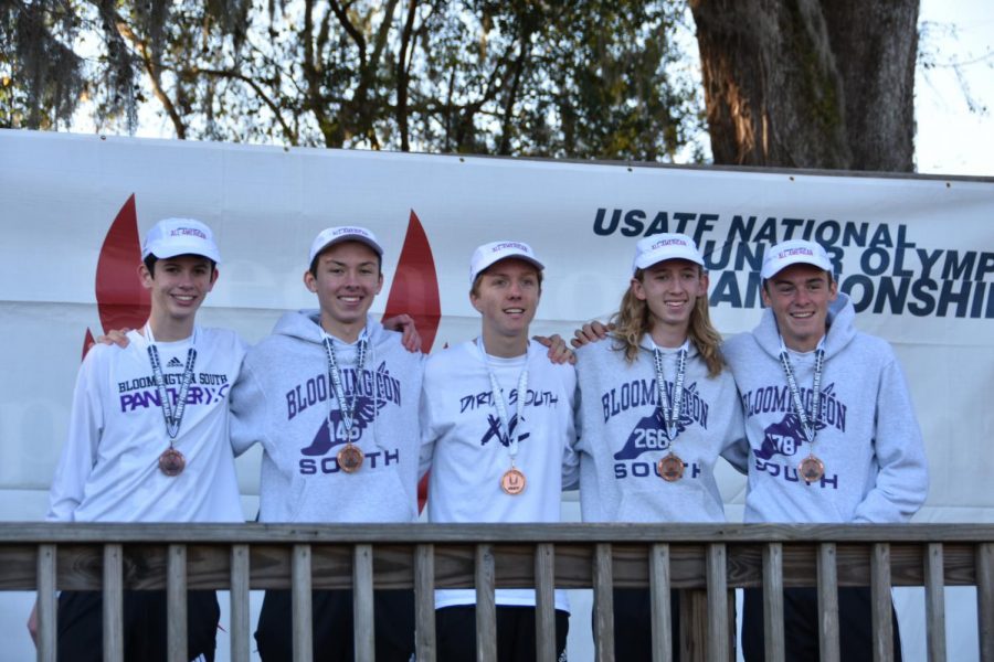 Members of the Dirty South XC USATF team pose with their all american medals. (from left to right) Josh MIller, Jack Gillard. Jake Wiznewsk, and Lucas Coniaris.  Photo courtesy of Caroline Shaw