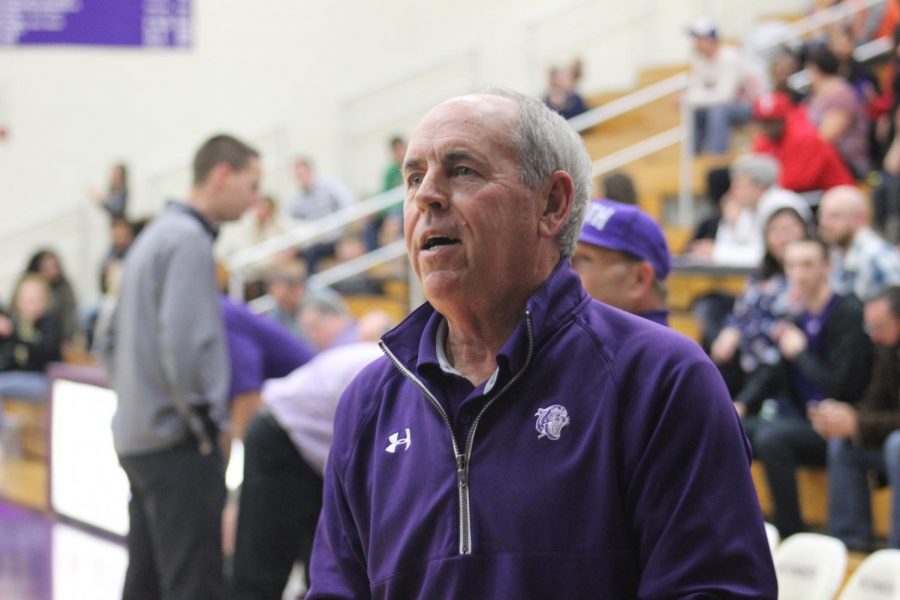 South coach JR Holmes looks on at the student section during a home game this year. Holmes, in his 35th year at South, led his team to break the record for regular season wins.