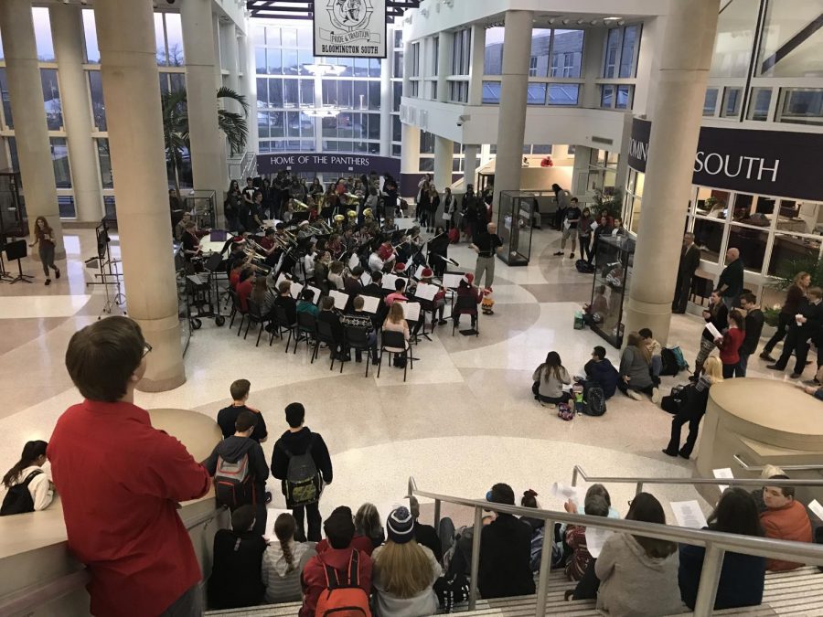 Band performs mini-Christmas concert in atrium