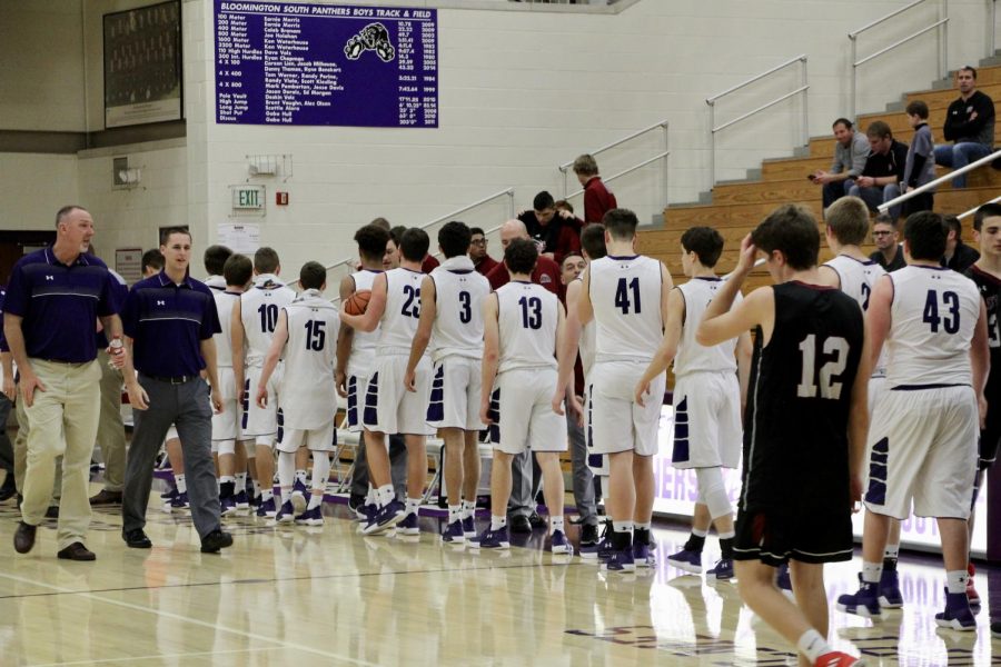 South shakes hands with the Lowell team.