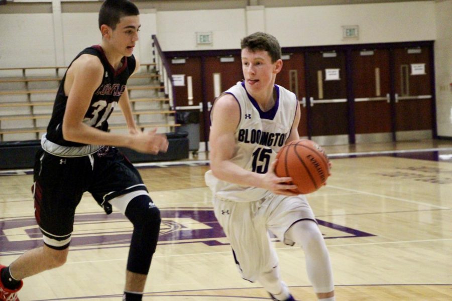 South guard Noah Jager (15) drives to the basket against Lowell during game one of the BHSS Classic. South went 3-0 and took home the inaugural classic title.