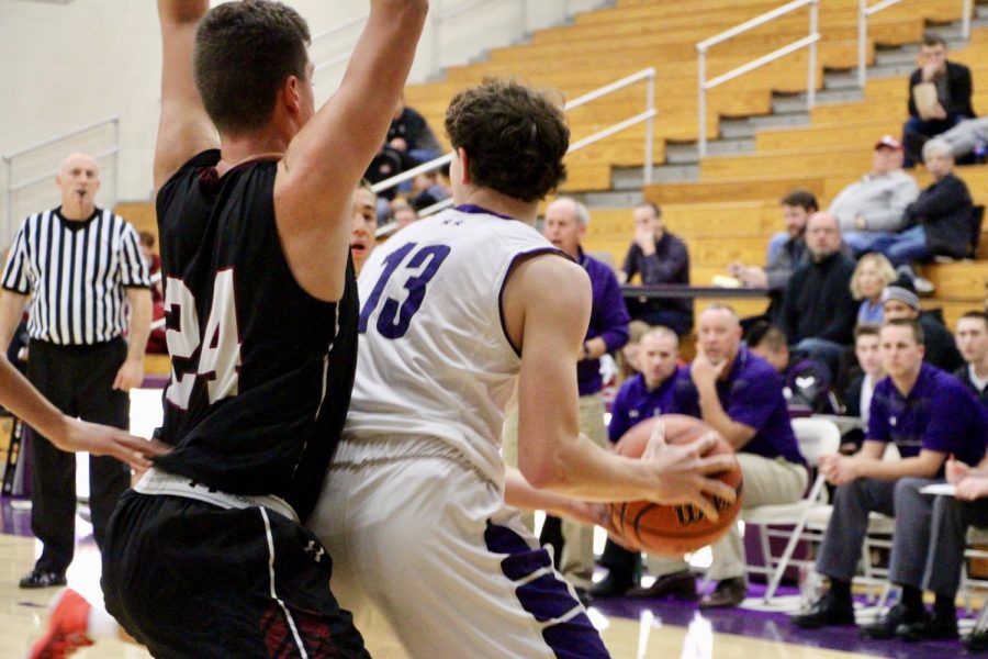 South's Wil Stockman (13) backs down a Lowell player in the post.