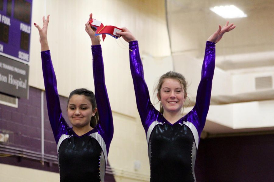 South's JV team of Carissa Moore and Brenna Batalon pose after receiving their ribbons.