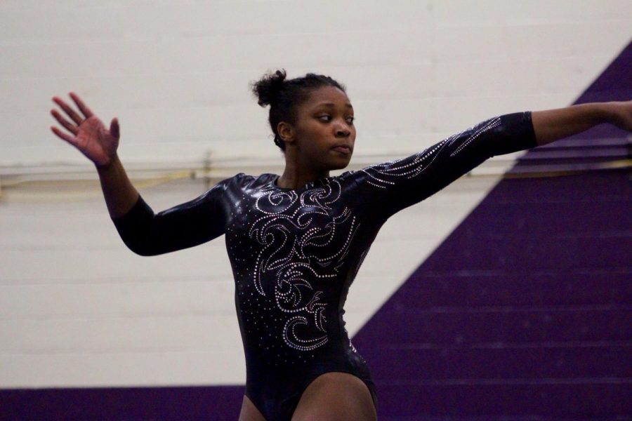 Norths Brittany Laffon poses during her floor routine. Laffon was first in all-around, beam and floor. 