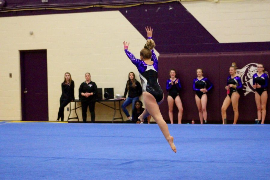 Souths Delaney Blubaugh prepares to do a stunt during her floor routine.