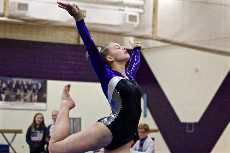 Souths Hailey Landis poses during her floor routine. Landis finished second overall on the floor, and South narrowly lost to North, 95.4-93.7.