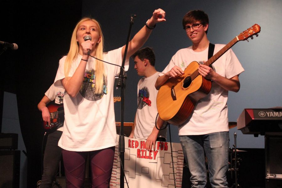 Senior Ashley Elliot announces the Elm Heights band.