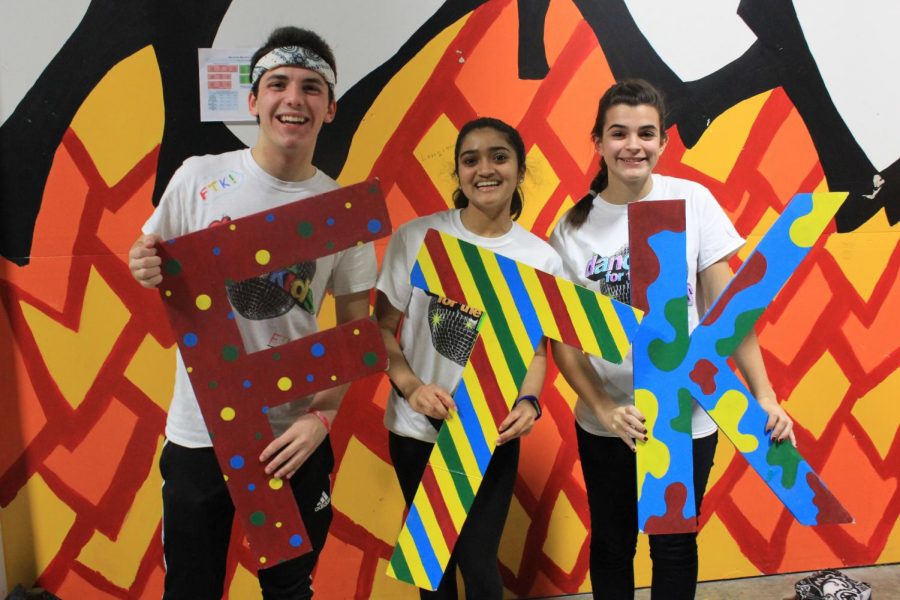 South students (L-R) Tommy  McEvilly, Naina Prabhakar, and Helen Christ pose for a photo.