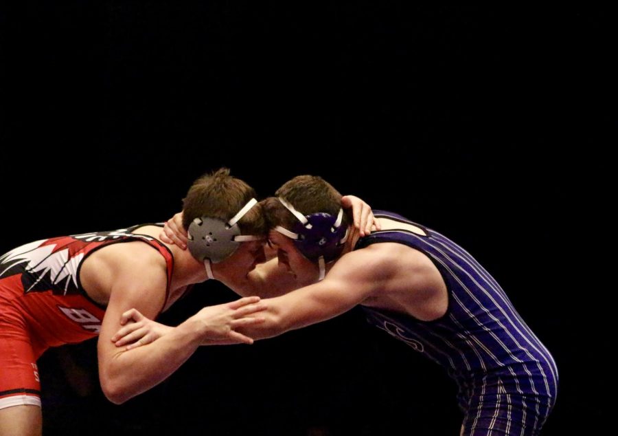 South's Wade Presson wrestles Terre Haute South's Brandon McPike in the 160 pound weight class.
