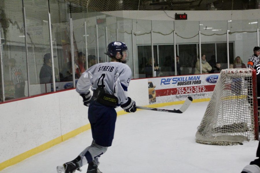 Bloomingtons Hayden Strieb (4) looks at the goal.