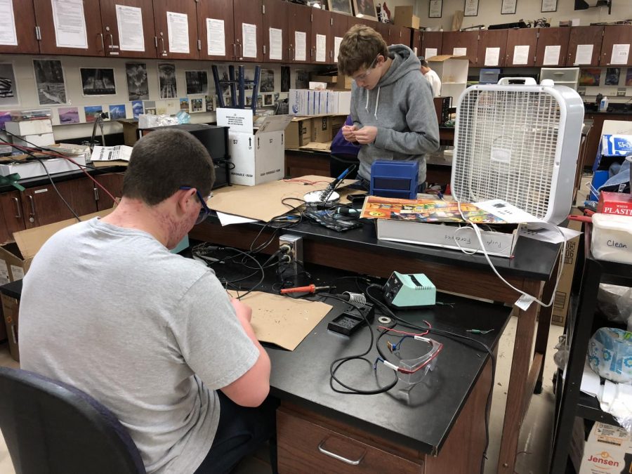 Physics II classes create circuit boards