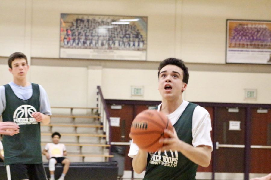 (2018) Ca$h Money guard Gio Alicea prepares to bank a fullcourt shot