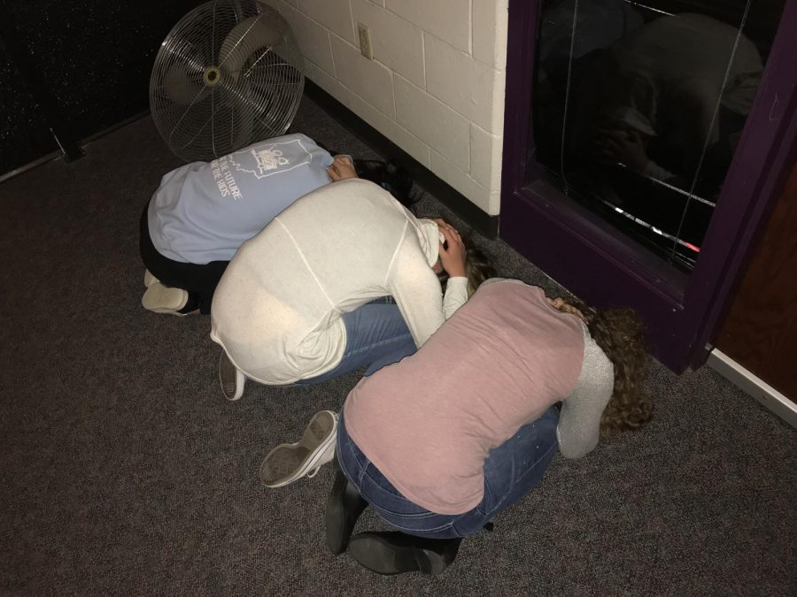 Students participate in tornado drill