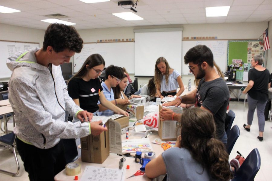 International students help Optimist create comment boxes