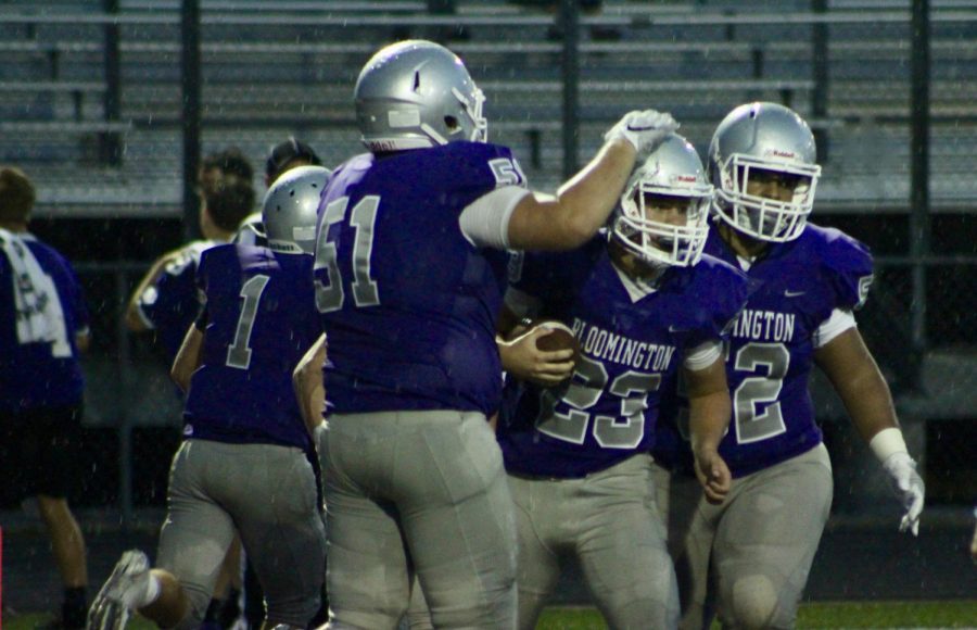 Senior quarterback Trent Richardson (23) celebrates a touchdown score off a QB scramble late in the second quarter.