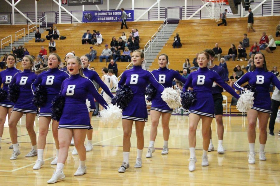 The South  varsity cheerleading squads performs at a boys basketball game last season.