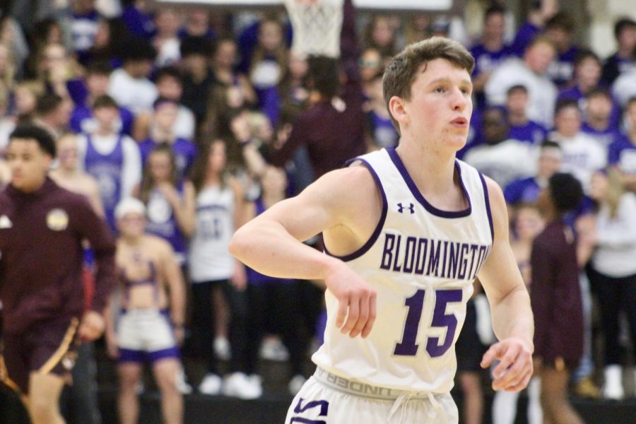 Junior guard Noah Jager (15) watches his shot during warmups. Jager scored 20 points in Souths 70-61 win