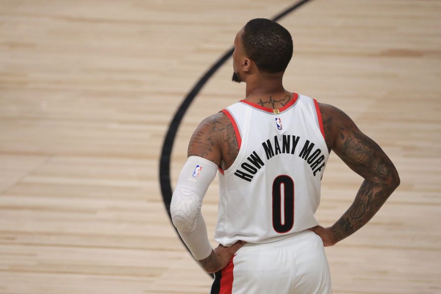 Portland Trail Blazers' Damian Lillard wearing a social justice jersey