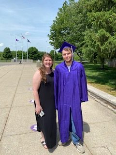 South+alumna+Chelsie+Davidson+stopped+by+school+to+snap+photos+of+her+brother+Bradley+Davidson%2C+who+is+graduating+this+year.+Bradley+will+attend+Ivy+Tech+and+would+like+to+be+a+pilot.+