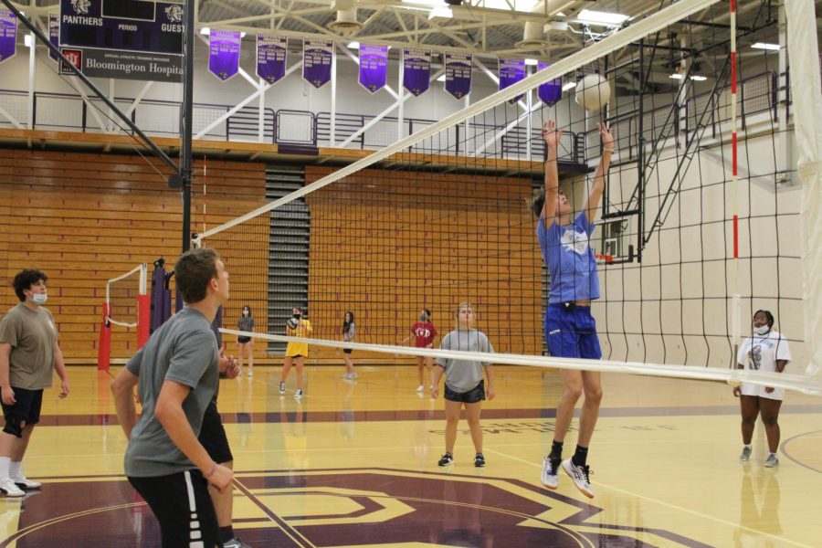 Students enjoy racquet and net sports in gym class. 