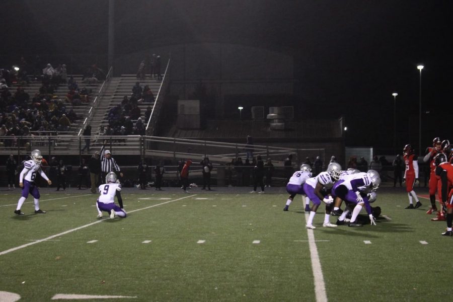 Kicker Nathan Zurface (69) getting ready to kick the ball for a field goal. 