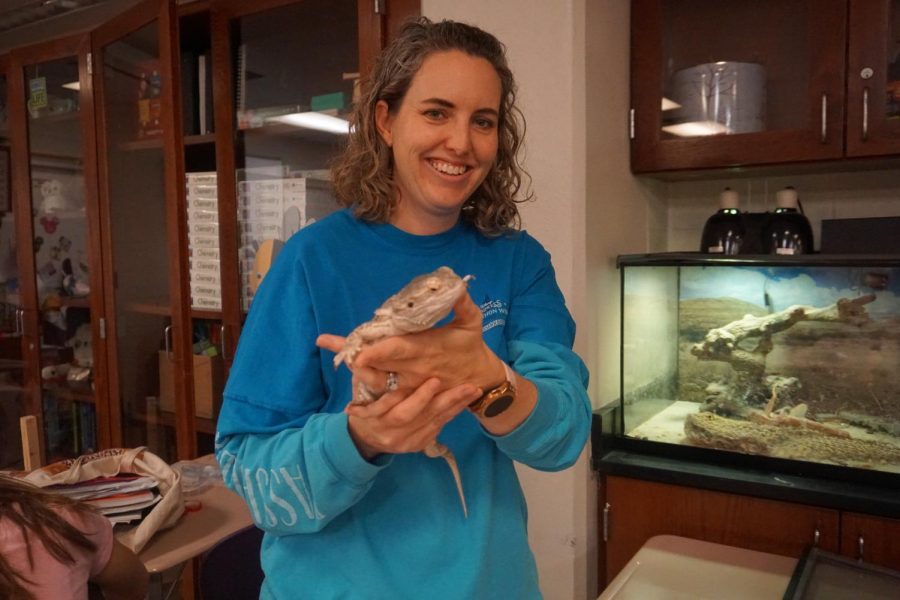 Shannon Wenning poses with class pet, Norbert.  