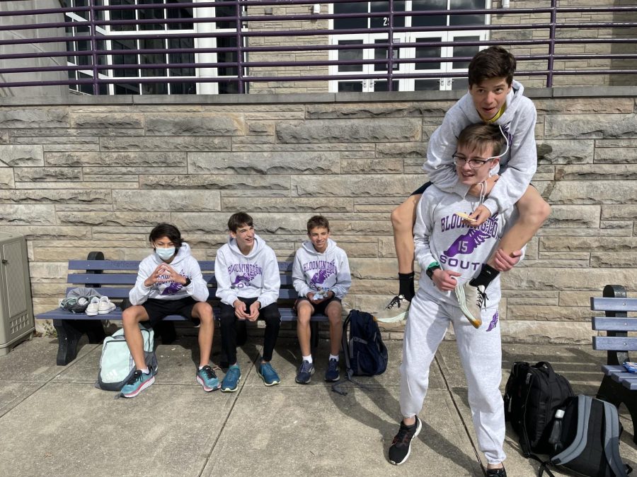Vasidy Bender, Leonardo Vesperini, Matt Stein, (on bottom) William Allsop, (on top) Marshall Caldwell hang out after track practice. The Panthers beat Columbus East in a meet April 2. 