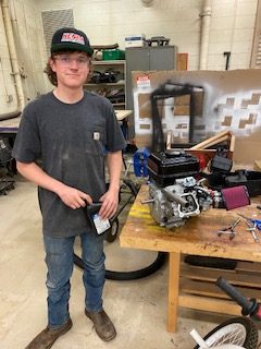Junior Phillip Emmert worked on his trike engine, which he built from scratch, during Pre-Engineering. 