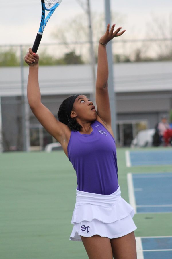 Sophomore Briah ONeal plays against Bloomington North at 1 singles