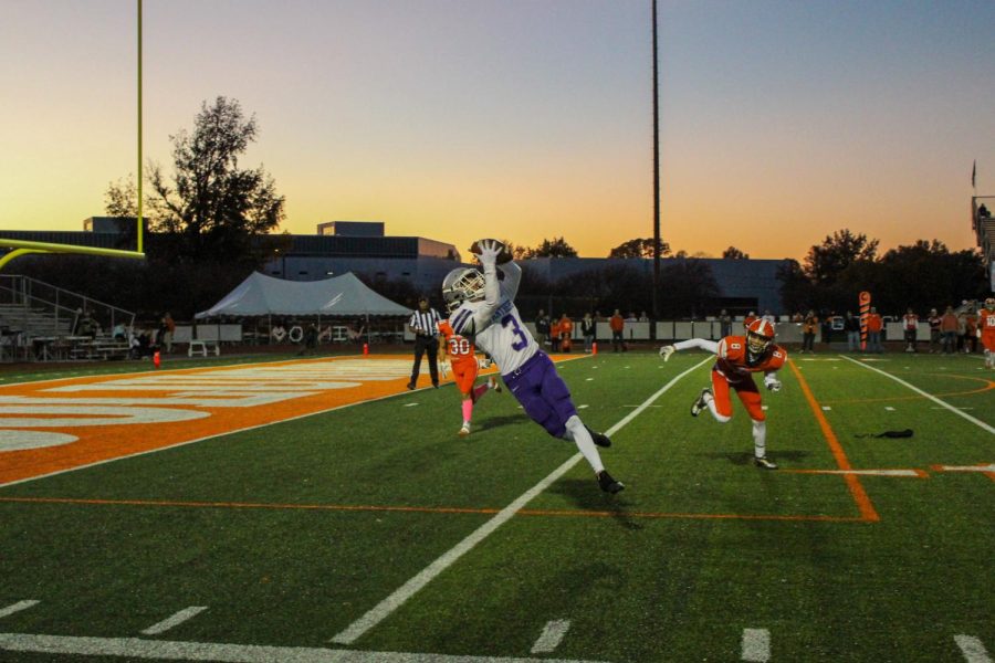 Lucas Waldon catches a pass for a touchdown against Columbus East.