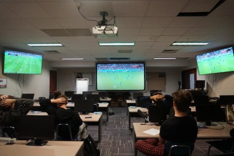 Soccer players watch World Cup in A325