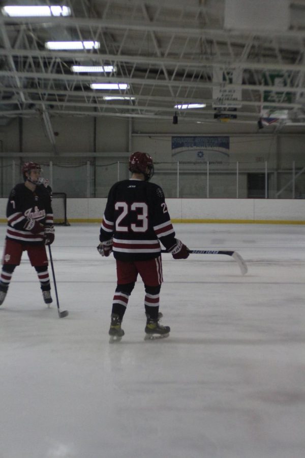 IUs Nicolas Castracane (23) confers with a teammate during IUs game against Ohio on January 14, 2023. 