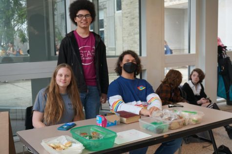 D & D club members, Bree Fort, Logan Addleman, and Jamison Everman sell baked goods to raise money