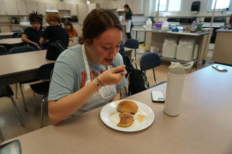 Adelynn Davis enjoys pancakes from Nutrition class