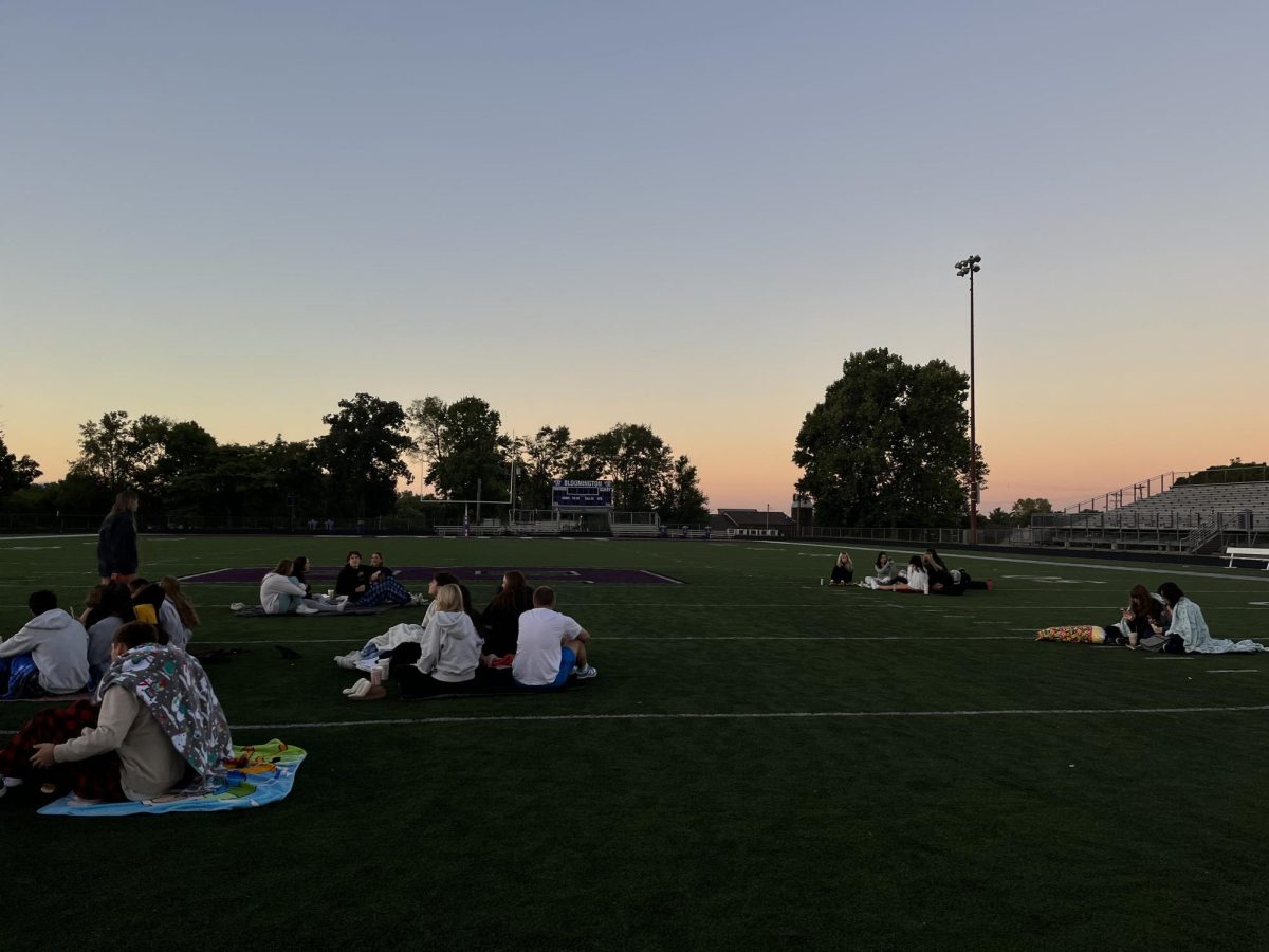 Seniors+Gathered+on+Football+Field+for+Senior+Sunrise