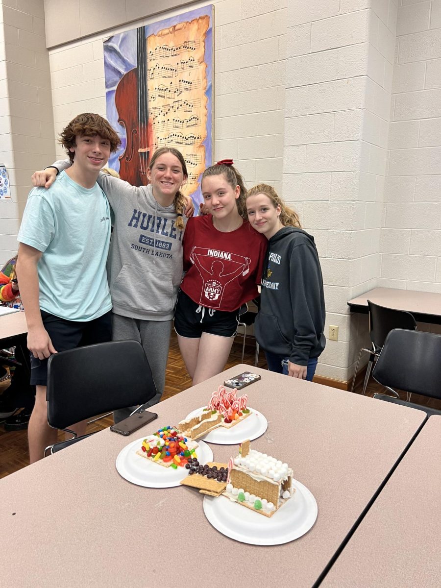 Tyler Christensen, Emma Nix, Tristan Farris, and Lacey Fisher (left to right) Win Best Overall In Habitat For Humanity’s Gingerbread Event