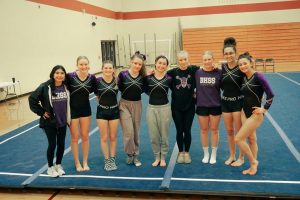 Bloomington South gymnastics team poses for a photo following the Conference Indiana championship meet