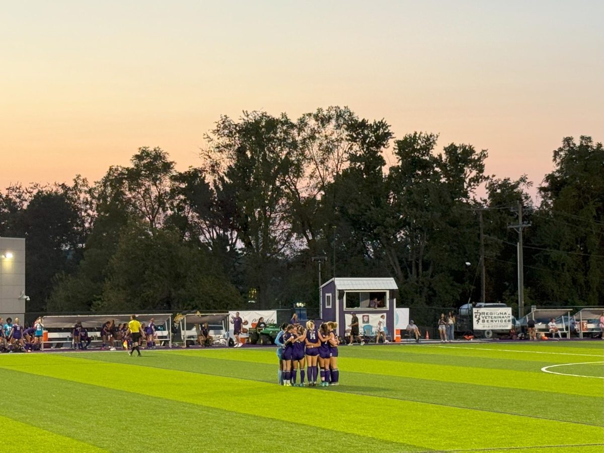 The South girls soccer team huddles before the varsity game vs. North. The Panthers won 5-0.