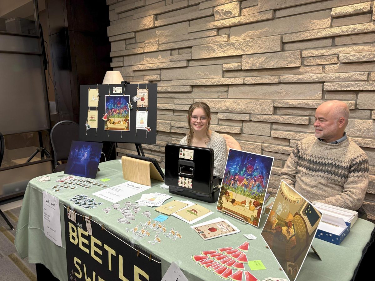 Junior Maisie Robinson at her Beetle Sweet booth