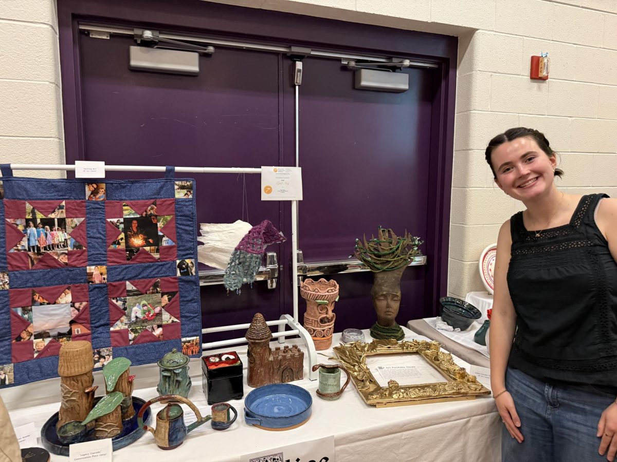 Alice Racek presents her art during Fine Arts night on April 22